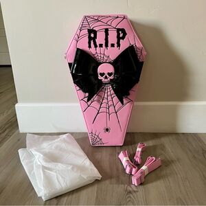 Dolls Kill oversize pink and black skull spiderweb coffin backpack. New in box